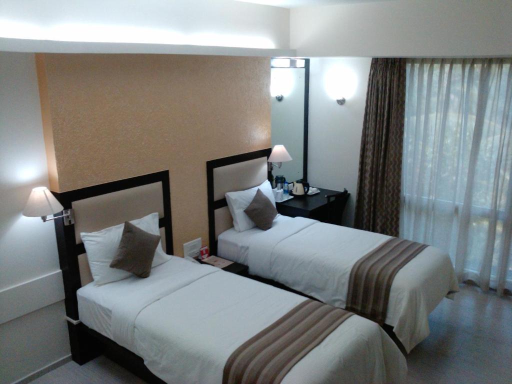 Pattom Royal Hotel Thiruvananthapuram Rum bild